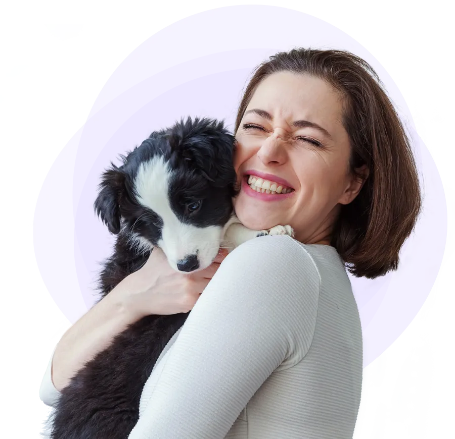 Woman hugging her dog